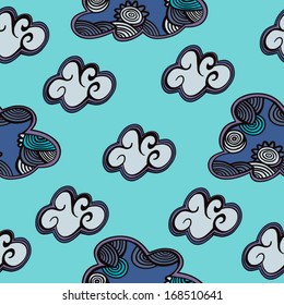 Seamless texture with white an blue clouds on blue background. Hand drawn vector art