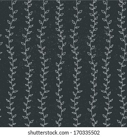 Seamless texture with white leaves on black