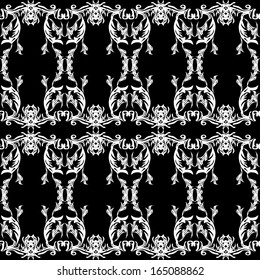 seamless texture. White patterns on a black background,