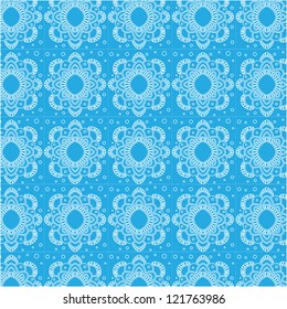 Seamless texture of white snowflakes on a blue background. Geometric ornament for Christmas./ Snowflakes