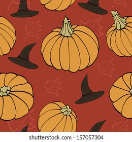 seamless texture with  witch hat and pumpkin 