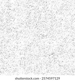 A seamless, textured background featuring a subtle, scattered pattern of black speckles on a white backdrop.