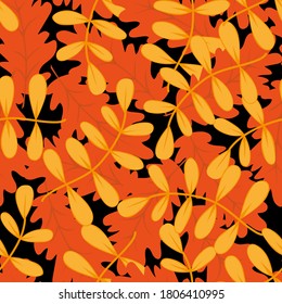 Seamless textured pattern with autumn leaves on a black background. Hand drawn background in flat style. Wallpaper, textile printing, wrapping paper, page filling, cover, web, packaging.