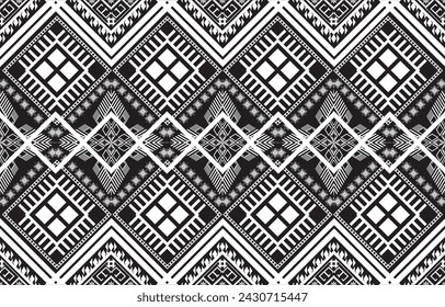 Seamless Textures with ethnic patterns. Navajo geometric abstract print. Decorative decoration with a rustic feel. The design is inspired by Native Americans. Colors are black and white.