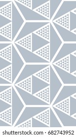 Seamless three-dimensional pattern of triangles. Geometric texture.