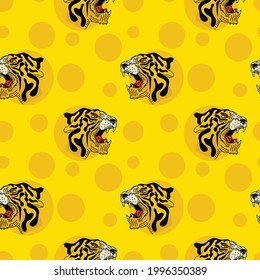 Seamless tiger head with polka dots  stylized tiger faces and polka dots. Cartoon Cartoon style.