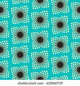 seamless tile with a dotted floral pattern in blue ivory and black