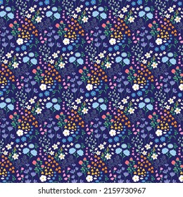 Seamless tile pattern. Floral pattern with many small flowers, leaves, and herbs in the field. Botanical print with colorful flowers repeating Vector file