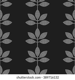 Seamless tiled black and white background with leaves in garlands. Dotted pattern. Vector Illustration. 