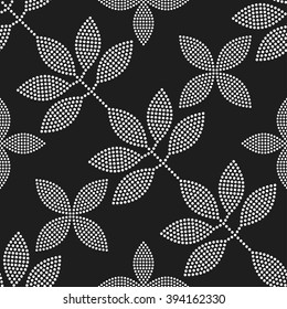 Seamless tiled black and white background with leaves in garlands and flowers. Dotted pattern. Vector Illustration. 