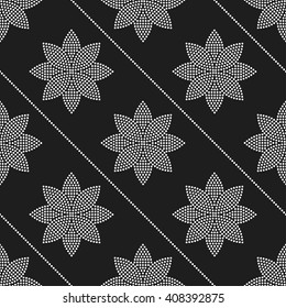 Seamless tiled black and white background of lotus flower and garlands mosaic. Dotted pattern. Vector Illustration.