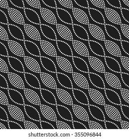 Seamless tiled black and white geometric mosaic chain pattern. Dotted background. Vector illustration.