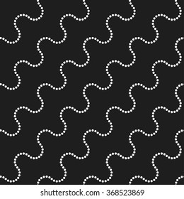 Seamless tiled black and white geometric wavy background of circles in garland. Dotted pattern. Vector Illustration. 