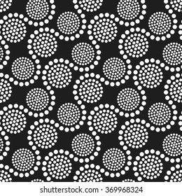 Seamless tiled black and white geometric wavy background of small and big circles in garland. Dotted pattern. Vector Illustration. 