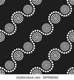 Seamless tiled black and white geometric wavy background of small and big circles in garland. Dotted pattern. Vector Illustration. 