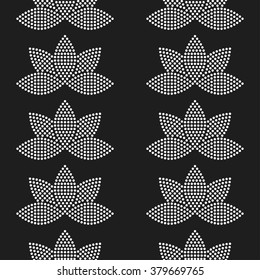 Seamless tiled black and white mosaic background of lotus flower in garlands. Dotted pattern. Vector Illustration.