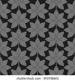 Seamless tiled black and white mosaic background of lotus flower in garlands. Dotted pattern. Vector Illustration.