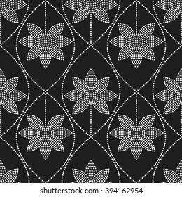 Seamless tiled black and white mosaic background of lotus flower in garlands. Dotted pattern. Vector Illustration.