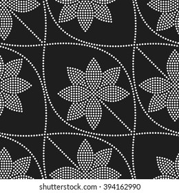 Seamless tiled black and white mosaic background of lotus flower in garlands. Dotted pattern. Vector Illustration.