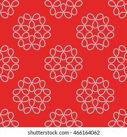 Seamless tiled Christmas red geometric zigzag pattern of dotted garlands. Beads. New year gift paper background. Vector illustration.