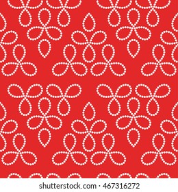Seamless tiled red geometric zigzag pattern of dotted triangles. Beads. Gift paper background. Vector illustration.