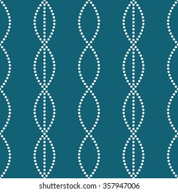 Seamless tiled turquoise geometric mosaic chain pattern. Dotted background. Vector illustration.
