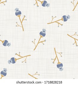 Seamless tossed floral pattern in french blue linen shabby chic style. Hand drawn country bloom texture. Rustic woven background. Kitchen towel home decor swatch. Simple flower motif all over print