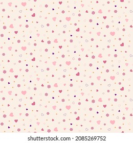 Seamless tossed pattern of small hearts, flowers, love text and polka dots.
