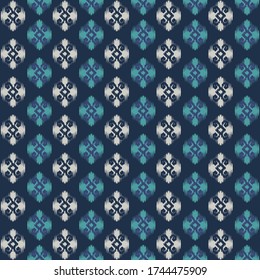 Seamless traditonal ethnic pattern on navy blue. Textile, fabric, background, decor, wallpaper motif