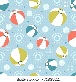 seamless travel pattern background with colorful beach ball on the sea