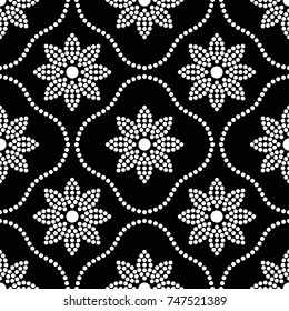 Seamless trellis pattern of dotted mosaic white flowers and beads. Floral motif. Vector Illustration.