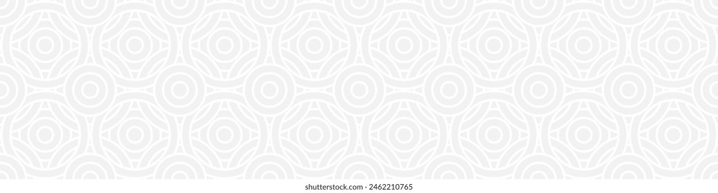 Seamless trend ornament of circles and arcs, geometric white shapes for textiles and wallpaper. Abstract panoramic pattern on a gray background for a New Year or wedding cover or card.