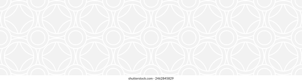 Seamless trend ornament of circles and arcs, geometric white shapes for textiles and wallpaper. Abstract panoramic pattern on a gray background for a New Year or wedding cover or card.