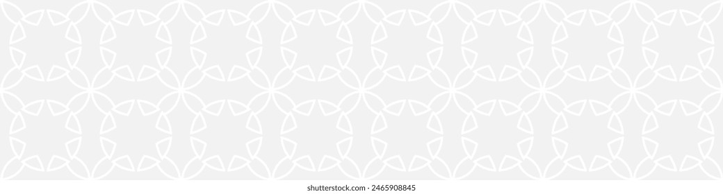 Seamless trend ornament of circles and arcs, geometric white shapes for textiles and wallpaper. Abstract panoramic pattern on a gray background for a New Year or wedding cover or card.