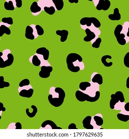 Seamless trend pattern. Light green background, black and pink leopard spots. The print is well suited for Wallpaper.