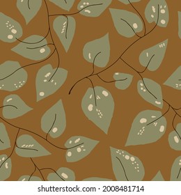 Seamless trendy natural autumn pattern, abstract green leaves,  brown background. Hand drawing. Design for textiles, wallpapers, printed products. Vector illustration