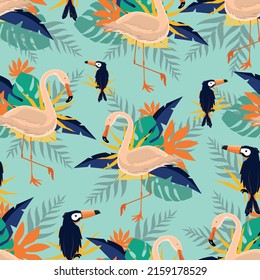 Seamless trendy tropical pattern with pink flamingo and toucan birds, tropic leaves on blue background. Vector illustration.