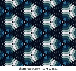 Seamless triangular pattern from white and green geometrical abstract ornaments on a dark background. Vector illustration. Suitable for fabric, wallpaper and wrapping paper