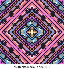 Seamless tribal boho pattern. Hand painted expressive ethnic flovoured motifs for textile,wrapping, decoration.