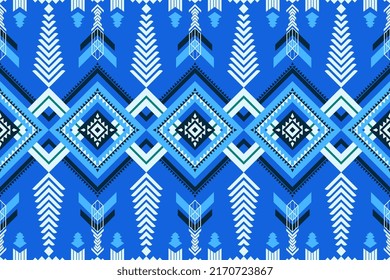 Seamless tribal pattern in blue tones with diamond shapes and arrow motifs. Ideal for textile, activewear, home decor, fashion design. vector, editable, EPS file. Design for fabric.