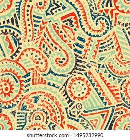 Seamless tribal pattern. Ethnic and aztec motifs. Print for african textiles. Patchwork hand-drawn ornament. Grunge texture. Vector illustration.