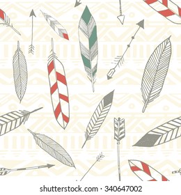 Seamless tribal pattern with feather and arrows