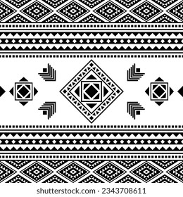 Seamless tribal pattern with geometric shapes in black and white colors. Aztec ethnic background design for fabric print and decoration.