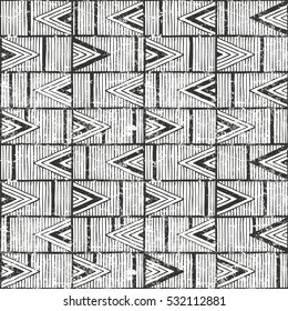 Seamless tribal pattern with grunge effect. Hand drawn monochrome background. EPS10 vector illustration.