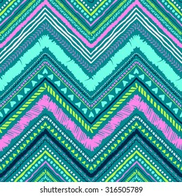 Seamless tribal zigzag pattern background that is hand-drawn with markers. Aztec creative illustration.