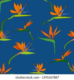 Seamless tropic pattern with exotic flowers paradise Strelitzia dark blue palm leaves. Vector tropical stock illustration.African plant flower.Design textile, wallpaper, wrapping paper, fabric, print.