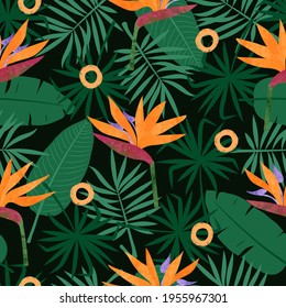 Seamless tropic pattern with strelitzia flowers and leaves. Vector tropical background