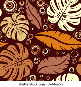 Seamless tropical background from leaves and circles.