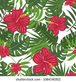 Seamless tropical floral pattern with hibiscus flowers, monstera and palm leaves.