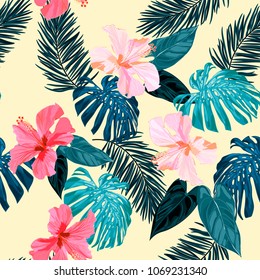 Seamless tropical hand drawn pattern with hibiscus flowers and exotic leaves.